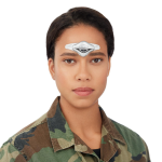 U.S. Military Gains Quicker Access to Migraine Relief through CEFALY a woman in a military uniform has a CEFALY migraine treatment device on her forehead